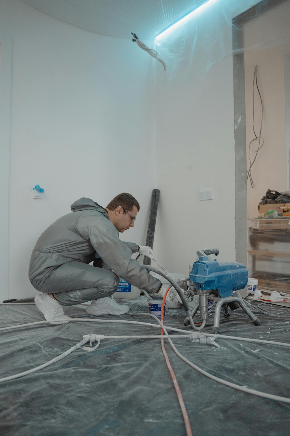 Water cleanup and drying equipment inside a damaged room